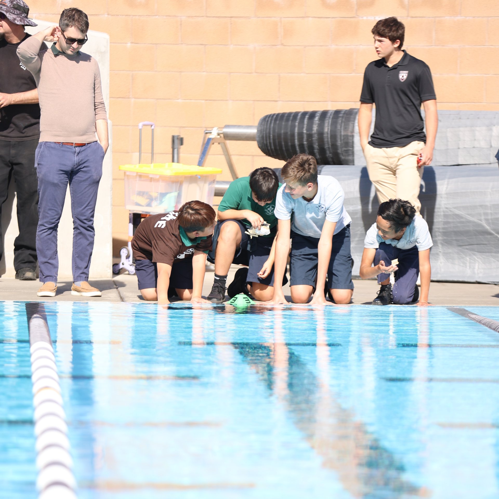 Contestants lined up ready to water test their boats before the regatta begins.